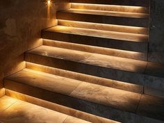 some steps lit up with lights in the dark