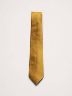 The perfect finishing touch, this tie is made from soft and smooth silk.  Measures 3" at widest point.  Length: 58" (147cm) Max width: 3" Yellow Classic Ties For Summer, Yellow Summer Business Ties, Luxury Yellow Tie For Men, Luxury Yellow Ties For Men, Yellow Bow Tie, Ochre Yellow, Silk Ties, Banana Republic, Mens Accessories