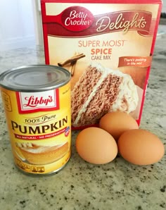 some eggs and cake mix on a counter next to a package of deli lights