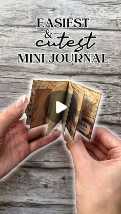 two hands holding an open book with the words easyest and cutest mini journal