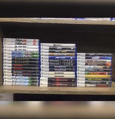 there are many different video games on the shelf