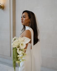 Stunning bride and a modern bouquet full of phalaenopsis orchids, calla lilies, and everyone’s favorite amaranthus 🌿 Photo by @elizabethpishalphoto Wedding | Bridal bouquet | Bay Area Weddings #sfflorist #bayareaflorist #floraldesign #weddingflorals #ihavethisthingwithflowers #myfloraldays #iloveflorists #weddingbouquet #bouquet #floralarrangement #underthefloralspell #floralinspiration #floralstories #botanicalpickmeup #flowersmakemehappy #justbefloral #flowermagic #moodforfloral #pursuepr... Bridal Bouquet With Calla Lilies, Bridal Bouquet With Amaranthus, Calls Lily Wedding Bouquet, Calla Lily Orchid Bouquet, Orchid Wedding Florals, Orchid And Lily Bouquet, Anthurium Bouquet Wedding, Calla Lilly Bouquets Wedding