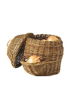 two wicker baskets with onions in them