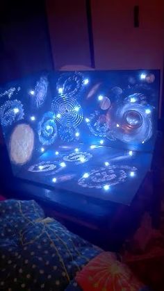 a bed that has some lights on it in the night time, and there is no image here to provide a caption for