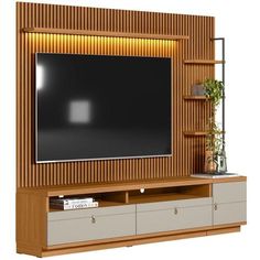 an entertainment center with a flat screen tv mounted on it's side and shelves below