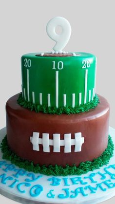 a football themed cake with the number two on top