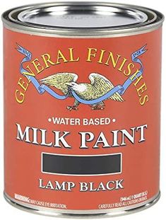 a can of white paint with an eagle on it