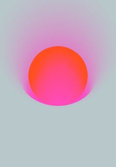 an orange and pink light shines brightly in the sky