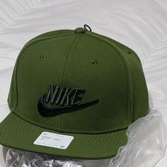 This Is A Brand New Nike Snap Back Cap Olive Green. Nike Casual Snapback Hat, Nike Baseball Cap, One Size Fits Most, Nike Baseball Cap Snapback, Nike Adjustable Snapback Baseball Cap, Casual Nike Baseball Cap, Nike Snapback Hats For Spring, Nike Adjustable Snapback Hat, Nike Casual Adjustable Snapback Hat, Nike Adjustable Snapback Hat With Curved Brim