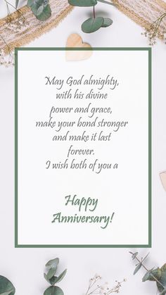 an anniversary card with eucalyptus leaves and hearts on it, surrounded by greenery in the background