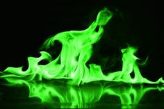 some green fire flames in the dark