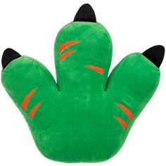 a green cactus shaped pillow with orange and black stripes on it's back end