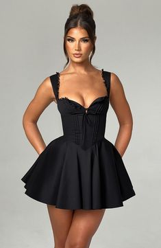 The super flirty, romantic Antonella mini dress will take you from bottomless brunch to garden parties and more. Made from a lightweight cotton blend, this mini has a super cinched waist contrasted with a full skirt, pintuck detailing to the front and lace up back. The fan shaped straps are adjustable for your perfect fit. Wear yours with lemon heels and bag. 



Colour: Black.

Premium nylon cotton blend fabric.

Fully lined.

Button detailing to bust.

Fan shape adjustable straps.

Tie on unde Holiday Dresses Women, Bottomless Brunch, Elegant Mini Dress, Black Tie Dress, Lace Splicing, Suspender Skirt, Mini Robes, Backless Mini Dress, Chic Outfit