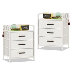 two white drawers with clocks on them