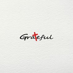 the word grateful written in black ink with a red cross on it's side