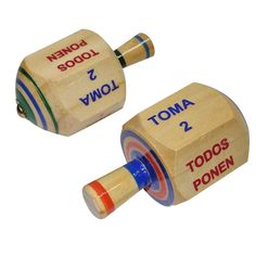 PRICES MAY VARY. Fine wood "Toma-Todo" toy game Set comes with 2 spinning tops Packed in a gift-able Kraft box Handcrafted and painted by skilled artisans Made in Mexico - No assembly required The toy "Pirinola" has been a very popular game in Mexico for a long time.   A handcrafted and painted traditional wood toy made by skillful artisans in Mexico.   This set two wooden pirinola spinning top.   This handmade toys come packed in a gift-able and pretty Kraft box.   No assembly required.   Two o Mexican Christmas Games, Mexican Christmas, Spinning Tops, Traditional Toys, The End Game, Kraft Boxes, Spinning Top, Traditional Mexican, Fiesta Party