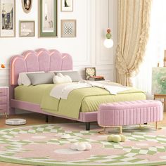 a bedroom with a pink bed and green bedspread