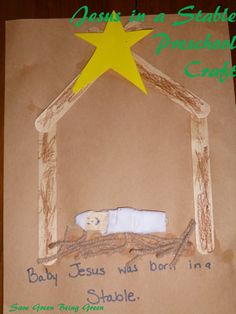 a child's drawing of a baby jesus in a manger with a star on top