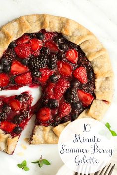 a berry pie with a slice missing from it