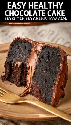 a piece of chocolate cake on a plate with a fork