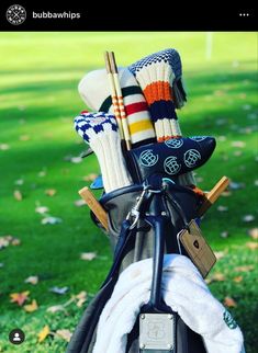 the golf bag is filled with many different things to put in it's holder