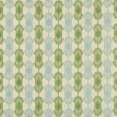 a green and white pattern on fabric