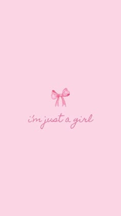 a pink wallpaper with the words in just a girl on it and a bow