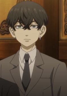 an anime man in a suit and tie looking at the camera with serious expression on his face