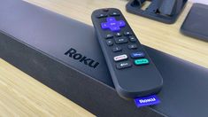 a remote control sitting on top of a box