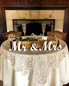 the table is decorated with mr and mrs signs