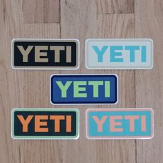 four stickers that say yeti, yeti, yeti and yeti