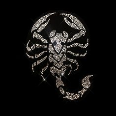 a crab made out of diamonds on a black background