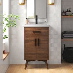 a bathroom vanity with a mirror above it and shelving on the wall next to it