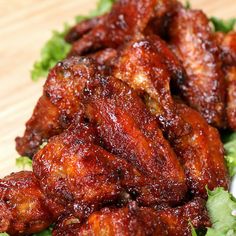 chicken wings with lettuce and sauce on a plate