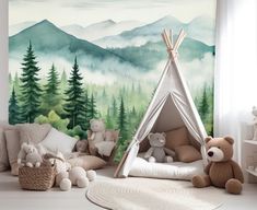 a child's room with a teepee tent, teddy bears and mountains painted on the wall