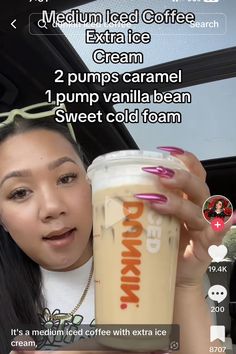 a woman holding up a cup of coffee in her hand with the caption's description below it