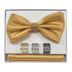 Ornate engraved detailing adds a touch of designer flair to this handsome bow-tie set featuring a vintage styling and interchangeable colored rings for added versatility. The perfect finishing touch to your favorite suit and tuxedo jackets. Men's Bow-Tie Set Butterfly Bow-Tie Interchangeable Attachments Matching Handkerchief Included Dry Clean Only Imported Knot Rings, Colored Rings, Vintage Styling, Formal Accessories, Bow Tie Set, Bow Ring, Knot Ring, Mens Bow Ties, True Red