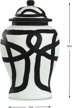 a white and black vase with an abstract design on the top, measurements for it