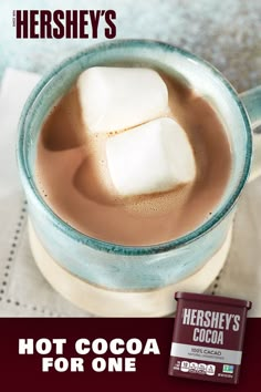 hot cocoa for one with marshmallows in the mug and hershey's chocolate bar