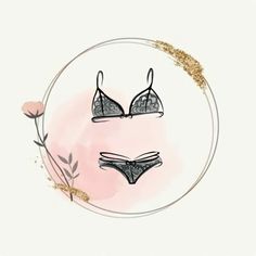 two bras are sitting on a plate with gold flakes around it and one has a flower in front of it