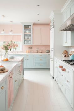 a kitchen with pink cabinets and white counter tops