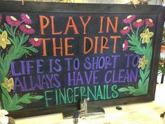 a sign that says play in the dirt life is to short to always have clean fingernails