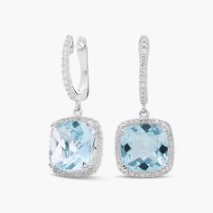 The serene hues of cushion-cut aquamarine are brightened by dazzling halos of round-cut diamonds on these 14k white gold earrings. Additional diamonds trail up the front hoop of the lever backing. Luxury Cushion Cut Halo Earrings, Cushion Cut Diamond Earrings With Accents, Precious Gemstones Jewelry, Aquamarine Earrings, White Gold Earrings, Diamond Halo, Round Cut Diamond, Cushion Cut, Halo Diamond