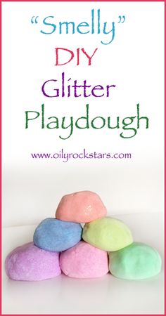 a pile of colorful playdoughs with the words smelly diy glitter playdough