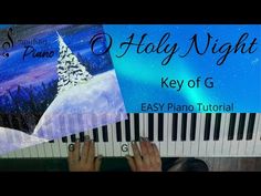 a piano keyboard with the words holly night and an image of a christmas tree on it