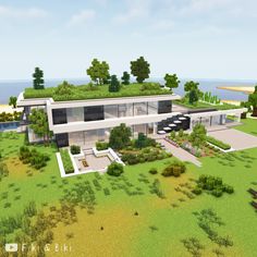 an aerial view of a modern house in the middle of a grassy area with trees and bushes