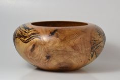 Hand Turned Red Oak Decorative Bowl.  Beautiful markings and wood knots are incorporated into the design.  The bowl has a low sheen finish which is food safe.   Care instructions:  Wipe with damp rag and dry immediately. Wood Serving Platter, Turned Bowls, Wood Turned Bowls, Wake Forest Nc, Turning Projects, Lathe Tools, Wake Forest, Decorative Bowl, Fine Woodworking