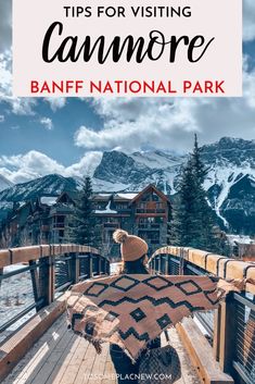 a person standing on top of a wooden deck with mountains in the background and text overlay that reads tips for visiting cammore banff national park