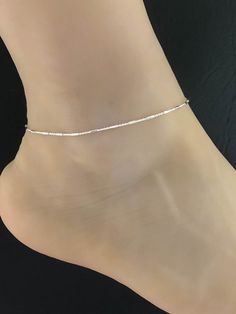 "Bar Rolo Anklet, Sterling Silver Ankle Bracelet, Simple Anklet ANKLET FEATURES: Metal: All components are made from solid .925 Sterling Silver Model is wearing 10\" in length solid .925 Sterling Silver Bead Chain Chain Length: 10\" An Extension will be added to the Anklet if needed. Please measure your ankle carefully and choose your desired length in inches at checkout. Please send me a message if you have any questions before or after placing your order. Please visit my storefront to view mor Wedding Anklets, Silver Ankle Bracelet, October Birthstone Jewelry, Beaded Ankle Bracelets, Beaded Ankle, Heart Anklet, Bracelet Simple, Ankle Chain, Foot Jewelry