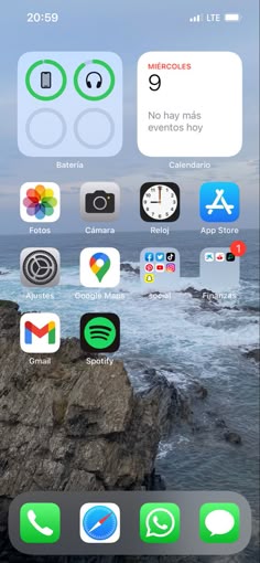 an iphone with several different icons on the screen